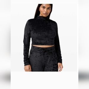 All aligned black velor top.